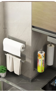 Close-up of gun grey matte kitchen rack with paper towel roll and cling film