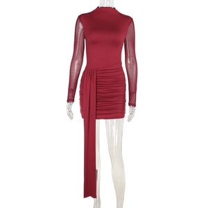 Close-up of wine red slim-fit dress featuring mesh long sleeves and pleated texture detail