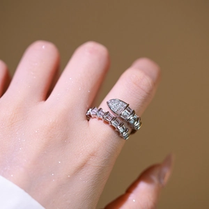 Adjustable silver snake ring with sparkling cubic zirconia scales and serpent head detail