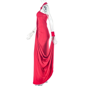 Detail view of the elegant red backless evening dress with side ruching and floor length