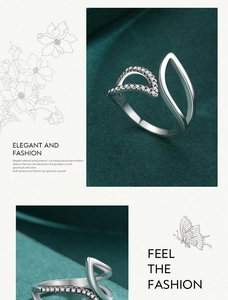 Macro detail of 925 silver leaf ring with micro-pave cubic zirconia on green velvet