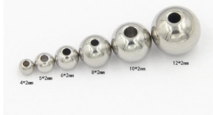 Detailed size chart showing various stainless steel spacer beads from 4mm to 12mm