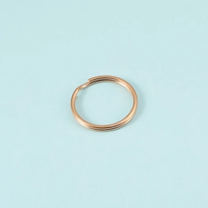 Close-up of a high-quality gold stainless steel split ring for DIY keychains