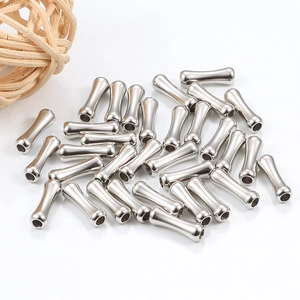 Macro shot of silver stainless steel tube beads for DIY bracelet making and jewelry design
