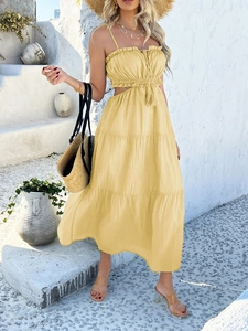 Detailed layered bohemian maxi dress with cut-out waist and tiered ruffle hemline