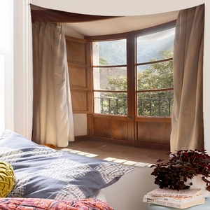 Cozy bedroom scene featuring a classic wood frame landscape tapestry on the wall