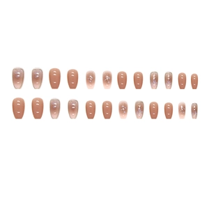 Pink gradient ballerina press-on nails with camellia flower art and glitter accents