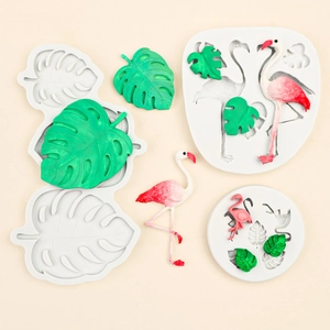Silicone monstera leaf and flamingo cake fondant molds with finished resin crafts