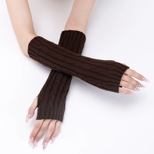 Detail of dark brown cable knit texture on 30cm fingerless arm warmers for winter