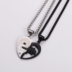 Couples heart pendant necklace set with matching key and lock in silver and black metal
