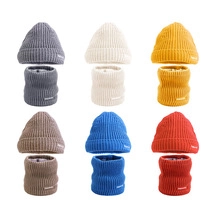 Knitted beanie and neck warmer set in six various colors for winter fashion