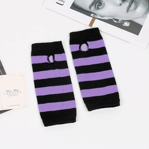 Detail view of purple and black striped knitted fingerless arm warmers with thumb holes
