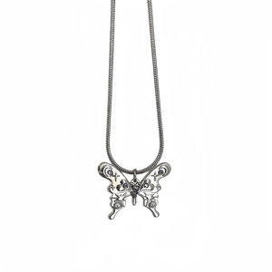 Y2K butterfly necklace in silver finish with purple gems and sleek snake chain