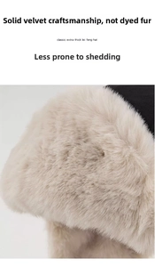 Detailed view of thickened winter hat featuring soft beige plush and flocked fabric texture