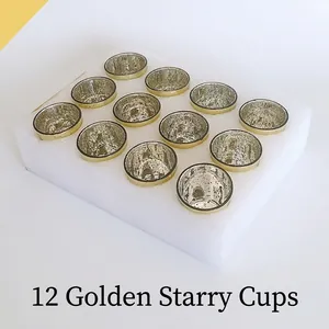 Set of 12 gold mercury glass candle holders with protective foam packaging