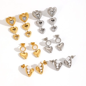 Luxurious titanium steel heart earrings with crystals and pearls in gold and silver finish