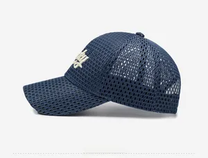 Detail view of navy blue mesh baseball cap with side white embroidery and red heart