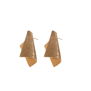 Golden irregular geometric metal stud earrings with textured stripes and hammered finish
