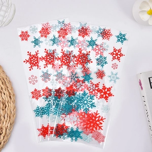 Sachets cadeaux de Noël transparents avec flocons rouges et bleus pour bonbons et gâteaux