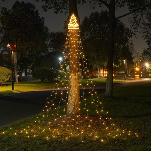 Outdoor solar LED star waterfall lights with warm yellow glow for Christmas tree decor