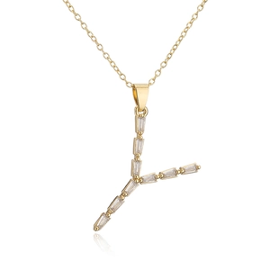 Close-up of gold-plated 18K letter Y pendant with cubic zirconia on a thin O-chain