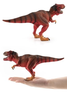 Realistic T-Rex dinosaur model with detailed skin texture shown in hand for size reference