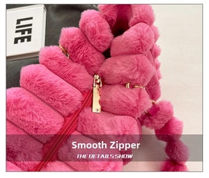 Close-up of smooth golden metal zipper on plush rose pink faux fur tote bag