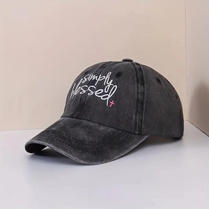 Dark gray washed denim baseball cap with simply blessed embroidery and pink cross
