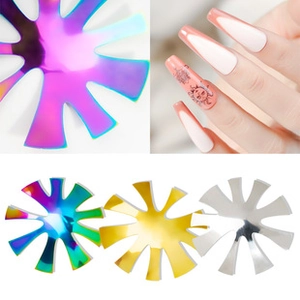 Detail of French manicure metal cutting tools in rainbow, gold, and silver finishes