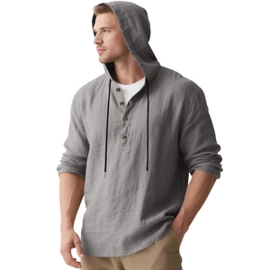 Detail of grey linen-cotton hoodie shirt featuring a drawstring hood and button placket