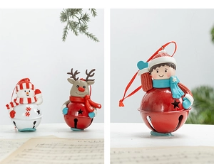 Detail view of Nordic Christmas metal bells with snowman and reindeer resin figurines