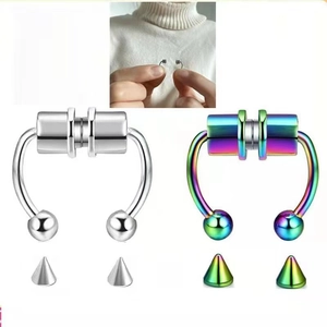 Magnetic faux septum rings set in silver and rainbow steel with spikes and ball ends