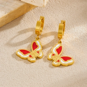 Gold stainless steel hoop earrings with red and white enamel butterfly pendants