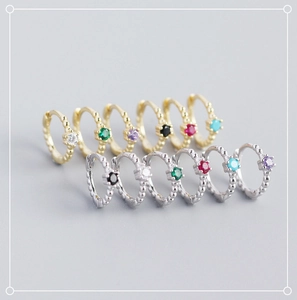 Detailed row of S925 sterling silver hoop earrings with multi-colored zircon stones