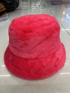 Detailed close-up showing thick plush texture of the red winter bucket hat for women