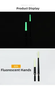 Macro detail showing luminous clock hands model 606 in both daylight and dark light effects