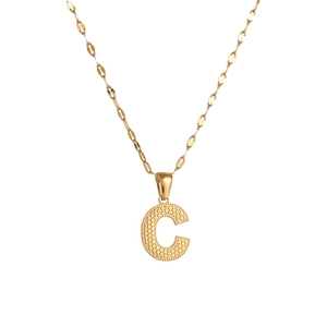 Textured gold letter C pendant necklace with refined dot pattern on a polished chain