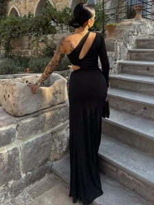 Slim fit black off-shoulder maxi dress with geometric waist cut-outs and elegant side slit