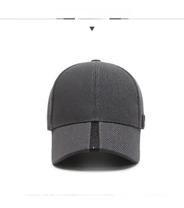 Front view of dark grey baseball cap with ribbed texture and black decorative strap