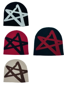 Detail of four knit beanies with star patterns in black, white, red, and beige colors