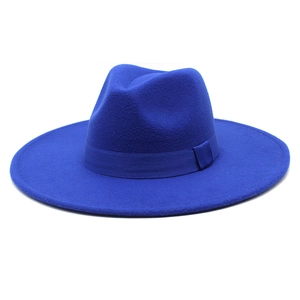 Detailed view of royal blue wool fedora hat with wide brim and matching ribbon band