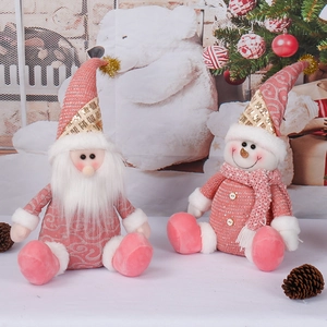 Pink and white plush Santa and Snowman Christmas dolls with golden sequins for holiday decor