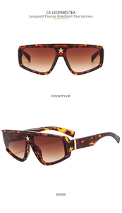 Detail of leopard print sunglasses with a gold star accent and gradient tea lenses