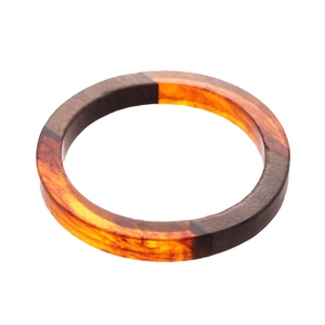 Retro round bangle made of dark wood and orange translucent resin with a glossy finish