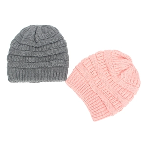 Set of grey and pink warm knitted hats with ribbed texture for winter fashion protection