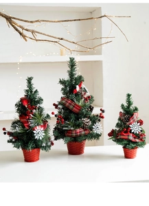 Three-piece mini tabletop Christmas trees set with tartan bows, berries and pine cones