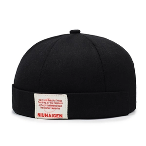 Klassische schwarze Miki-Mütze aus Baumwolle mit gewebtem Patch für Vintage-Streetstyle