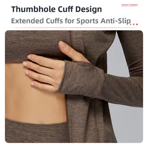 Detail of thumbhole cuffs on a brushed thermal running jacket for outdoor sports