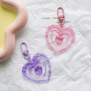 Pink and purple hollow heart keychains with tiered acrylic nested design and lobster clasp