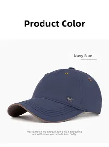 Detail view of navy blue baseball cap with metallic side logo and two-tone brim